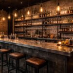 découvrez comment aménager un bar élégant avec un comptoir en zinc, des étagères ikea industrial et un éclairage vintage pour une ambiance chaleureuse et industrielle.